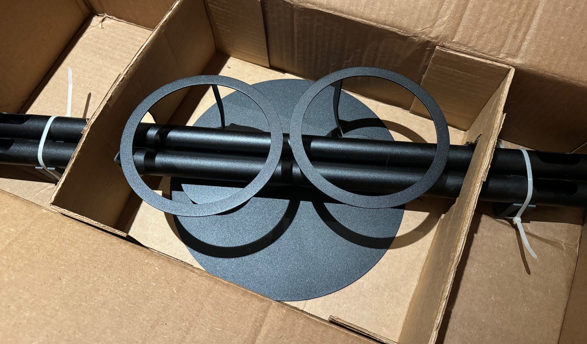 A NoBox HomePod floor stand in white, photographed against a plain ground during the 2023 production problems described in this post.