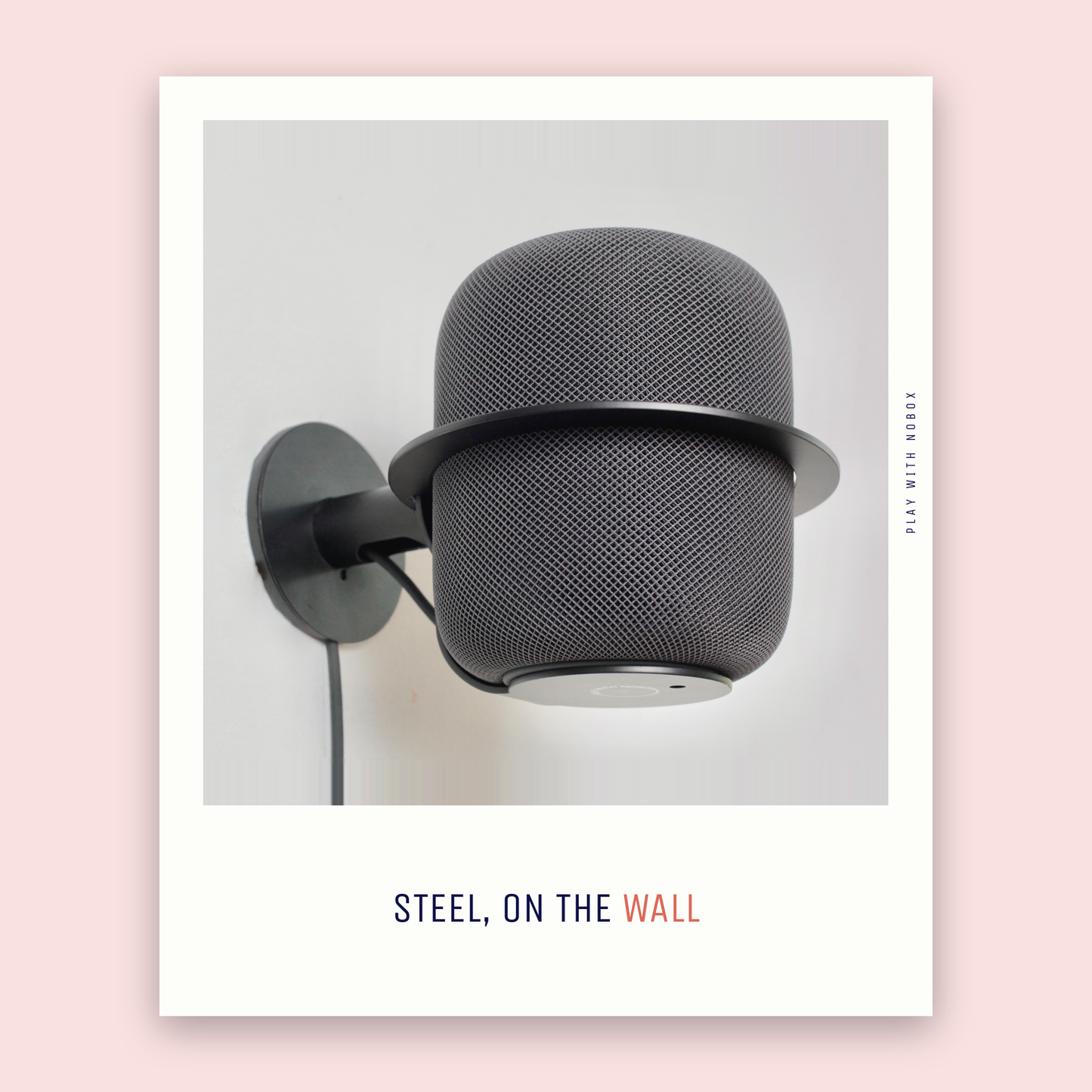 Black NoBox wall mount with HomePod mounted on a real wall, photograph