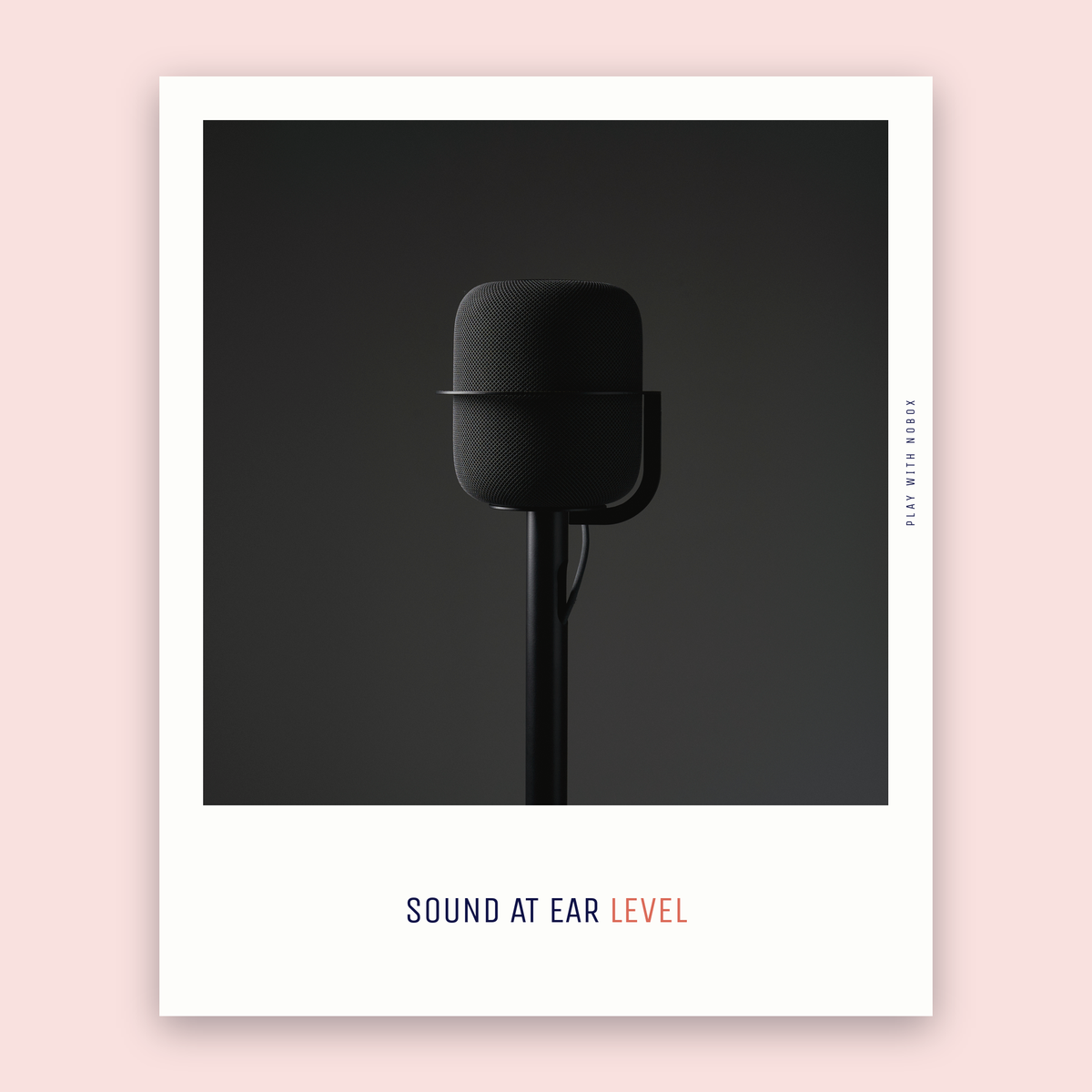 The black NoBox floor stand raising an Apple HomePod to ear level